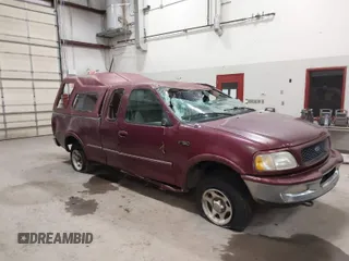 1997 Ford F-150 XL with VIN 1FTEX18L3VKC91921, listed as a IAAI auction lot 41820453 with 210,553 mi miles. Bid and sale history available at carsss.com. Image 1.