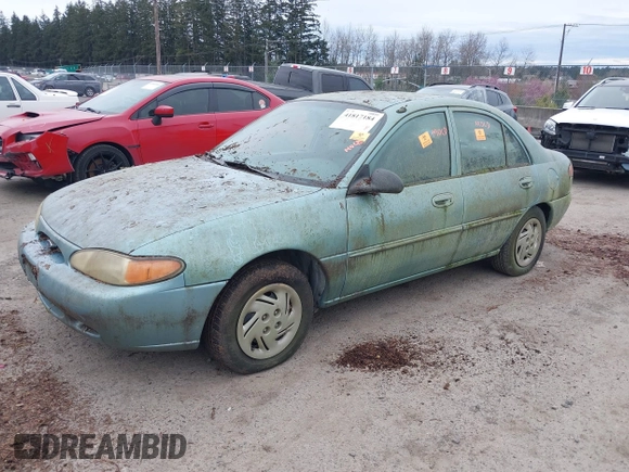 1998 Ford Escort SE z VIN 1FAFP13P5WW267120, wystawiony jako IAAI lot #41817184 z przebiegiem 167 299 mil mil oraz . Historia ofert i sprzedaży dostępna na DreamBid. Obrazek 2.