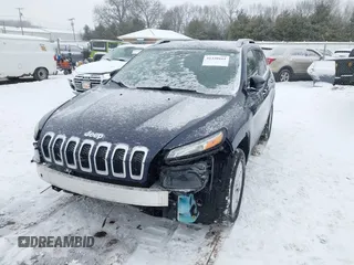 2014 Jeep Cherokee Altitude with VIN 1C4PJMCB9EW187288, listed as a IAAI auction lot 41320161 with 169,534 mi miles and . Bid and sale history available at DreamBid. Image 18.