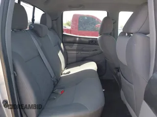 2015 Toyota Tacoma with VIN 3TMLU4EN6FM188736, listed as a IAAI auction lot 42605859 with 210,717 mi miles and . Bid and sale history available at DreamBid. Image 8.