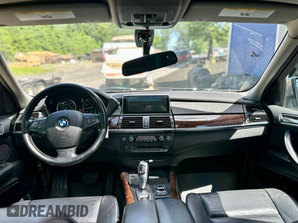2012 BMW X5 35i with VIN 5UXZV4C55CL986439, listed as a Copart auction lot 63034725 with 188,238 mi miles and Clean title. Bid and sale history available at DreamBid. Image 9.