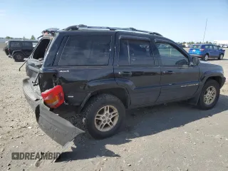 1999 Jeep Grand Cherokee Limited with VIN 1J4GW68N4XC679841, listed as a Copart auction lot 59760015 with 155,366 mi miles and Salvage title. Bid and sale history available at DreamBid. Image 3.