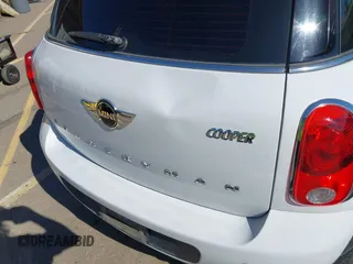 2015 MINI Countryman with VIN WMWZB3C51FWR45357, listed as a IAAI auction lot 41871831 with 201,358 mi miles and . Bid and sale history available at DreamBid. Image 6.