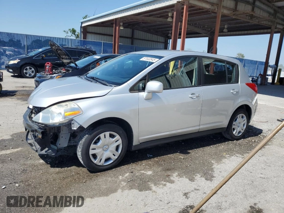2010 Nissan Versa SL with VIN 3N1BC1CP7AL447706, listed as a Copart auction lot 57443545 with 126,107 mi miles and Salvage title. Bid and sale history available at DreamBid. Image 1.