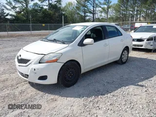 2009 Toyota Yaris with VIN JTDBT903991303431, listed as a IAAI auction lot 41794505 with 183,917 mi miles. Bid and sale history available at carsss.com. Image 2.