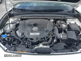 2024 Mazda CX-30 Premium z VIN 3MVDMBDY7RM706554, wystawiony jako IAAI lot #42322863 z przebiegiem 2817 mil mil oraz . Historia ofert i sprzedaży dostępna na DreamBid. Obrazek 10.