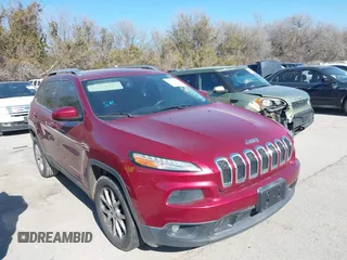 2014 Jeep Cherokee Latitude z VIN 1C4PJLCB5EW268895, wystawiony jako IAAI lot #41377252 z przebiegiem 185 637 mil mil oraz . Historia ofert i sprzedaży dostępna na DreamBid. Obrazek 1.