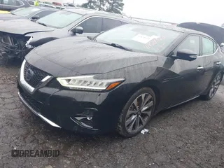 2020 Nissan Maxima Platinum with VIN 1N4AA6FV6LC382860, listed as a IAAI auction lot 41429323 with 87,689 mi miles and . Bid and sale history available at DreamBid. Image 2.
