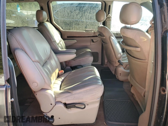 1999 Chrysler Town & Country LXi with VIN 1C4GP64L1XB599412, listed as a Copart auction lot 76901614 with Not Provided miles and Salvage Title. Bid and sale history available at carsss.com. Image 11.