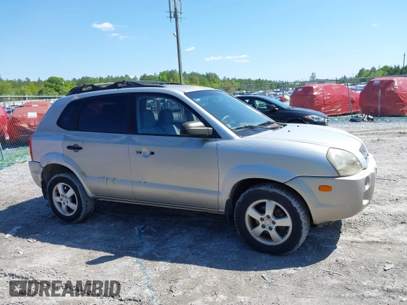 2006 Hyundai Tucson GL with VIN KM8JM12BX6U249982, listed as a IAAI auction lot 41976033 with 107,153 mi miles. Bid and sale history available at carsss.com. Image 13.