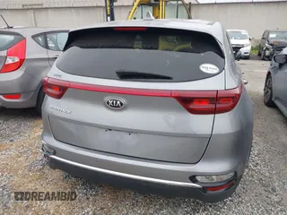 2021 Kia Sportage LX with VIN KNDPM3AC2M7931660, listed as a IAAI auction lot 41924609 with 55,512 mi miles. Bid and sale history available at carsss.com. Image 17.