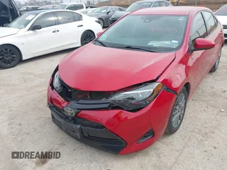 2019 Toyota Corolla L with VIN 5YFBURHEXKP882871, listed as a IAAI auction lot 41747710 with 104,117 mi miles. Bid and sale history available at carsss.com. Image 6.