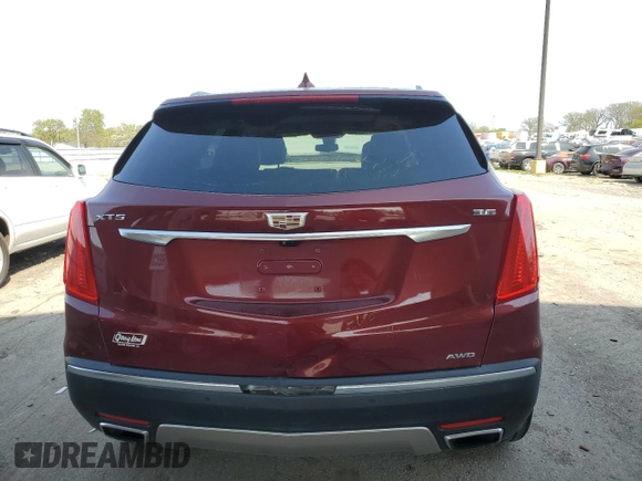 2017 Cadillac XT5 Platinum AWD z VIN 1GYKNFRS8HZ135312, wystawiony jako Copart lot #54057225 z przebiegiem 170 657 mil mil oraz Szkoda całkowita • Salvage title. Historia ofert i sprzedaży dostępna na DreamBid. Obrazek 6.