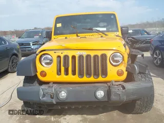 2012 Jeep Wrangler Sport with VIN 1C4AJWAG0CL128595, listed as a IAAI auction lot 42048590 with 133,085 mi miles and . Bid and sale history available at DreamBid. Image 12.