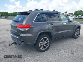 2018 Jeep Grand Cherokee Limited with VIN 1C4RJFBG2JC334970, listed as a IAAI auction lot 42346729 with 83,059 mi miles and . Bid and sale history available at DreamBid. Image 4.