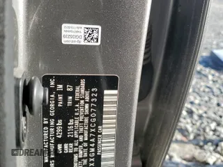 2012 Kia Optima LX z VIN 5XXGM4A7XCG077323, wystawiony jako Copart lot #50527465 z przebiegiem 194 243 mil mil oraz Szkoda całkowita • Salvage title. Historia ofert i sprzedaży dostępna na DreamBid. Obrazek 13.