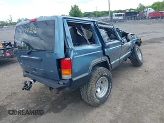 1997 Jeep Cherokee Sport with VIN 1J4FJ68S8VL557562, listed as a IAAI auction lot 42157736 with Not provided miles and . Bid and sale history available at DreamBid. Image 4.