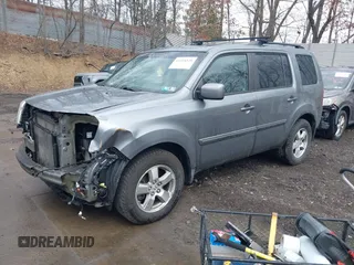 2009 Honda Pilot EX-L with VIN 5FNYF48669B033858, listed as a IAAI auction lot 41918525 with 161,605 mi miles and . Bid and sale history available at carsss.com. Image 2.