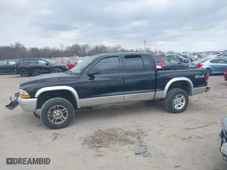 2004 Dodge Dakota SLT with VIN 1D7HG48N14S503851, listed as a IAAI auction lot 41883437 with 225,505 mi miles. Bid and sale history available at carsss.com. Image 14.