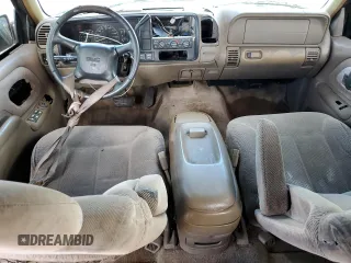 1999 GMC Suburban with VIN 3GKFK16R8XG531621, listed as a Copart auction lot 46593105 with 221,125 mi miles and Salvage Title. Bid and sale history available at carsss.com. Image 8.