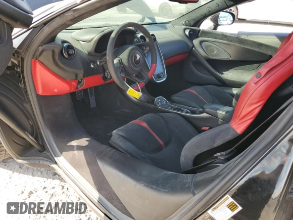 2019 McLaren 570S z VIN SBM13FAA1KW006404, wystawiony jako Copart lot #78088414 z przebiegiem 17 852 mil mil oraz Szkody całkowita. Historia ofert i sprzedaży dostępna na DreamBid. Obrazek 8.