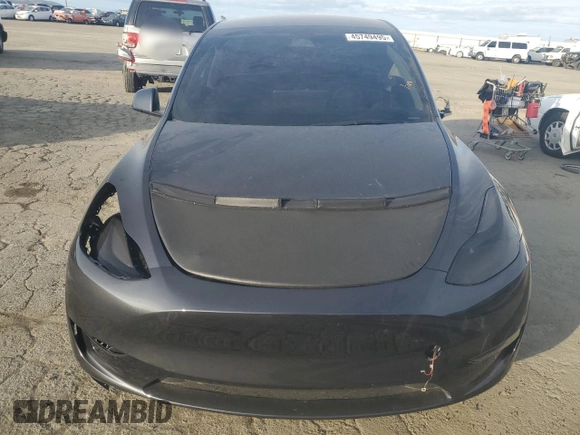 2024 Tesla Model Y Performance z VIN 7SAYGDEF3RF078535, wystawiony jako Copart lot #45749495 z przebiegiem 8 852 mil mil oraz Szkoda całkowita • Salvage title. Historia ofert i sprzedaży dostępna na DreamBid. Obrazek 5.