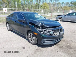 2017 Honda Civic Sedan LX with VIN 19XFC2F57HE061090, listed as a IAAI auction lot 41887402 with 129,167 mi miles. Bid and sale history available at carsss.com. Image 1.
