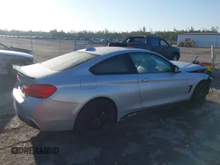 2015 BMW 4 Series 428i xDrive z VIN WBA3N9C56FK246118, wystawiony jako IAAI lot #41923623 z przebiegiem 113 207 mil mil oraz . Historia ofert i sprzedaży dostępna na DreamBid. Obrazek 4.