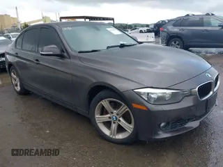 2012 BMW 3 Series 328i with VIN WBA3A5C56CF340525, listed as a IAAI auction lot 41934931 with 173,310 mi miles. Bid and sale history available at carsss.com. Image 1.
