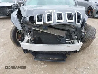 2015 Jeep Cherokee Limited with VIN 1C4PJMDS5FW587879, listed as a IAAI auction lot 41864622 with 143,843 mi miles. Bid and sale history available at carsss.com. Image 6.