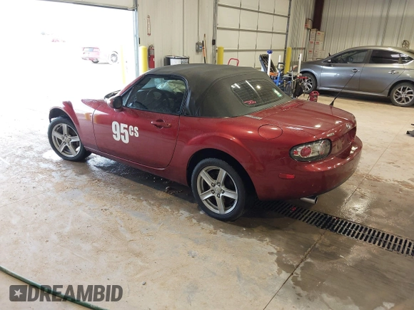 2007 Mazda MX-5 Miata Sport z VIN JM1NC25F970132299, wystawiony jako IAAI lot #41622791 z przebiegiem 72 392 mil mil oraz . Historia ofert i sprzedaży dostępna na DreamBid. Obrazek 3.