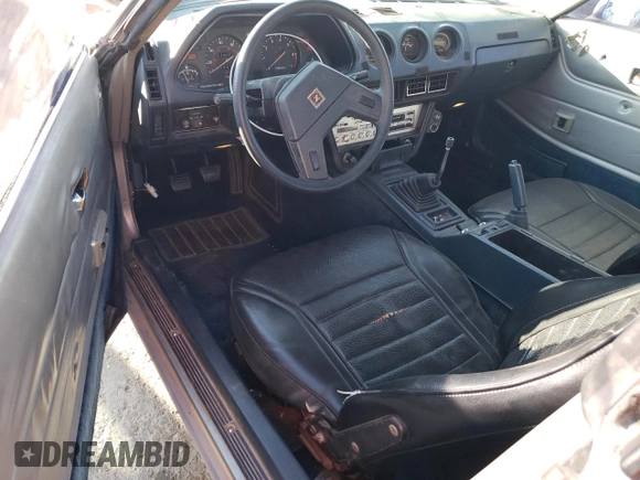 1983 Datsun 280ZX 2+2 z VIN JN1HZ06S2DX506351, wystawiony jako Copart lot #74302484 z przebiegiem 17 211 mil mil oraz Szkody całkowita. Historia ofert i sprzedaży dostępna na DreamBid. Obrazek 8.