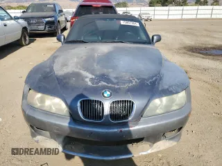 2000 BMW Z3 z VIN WBACH3345YLF71774, wystawiony jako Copart lot #75007354 z przebiegiem 170 924 mil mil oraz Szkody całkowita. Historia ofert i sprzedaży dostępna na DreamBid. Obrazek 5.