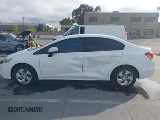 2014 Honda Civic LX with VIN 19XFB2F52EE200749, listed as a IAAI auction lot 42004489 with 213,818 mi miles and . Bid and sale history available at DreamBid. Image 14.