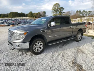 2016 Nissan Titan SL z VIN 1N6BA1F29GN515240, wystawiony jako Copart lot #45185835 z przebiegiem 137 164 mil mil oraz Czysty tytuł • Clean title. Historia ofert i sprzedaży dostępna na DreamBid. Obrazek 1.