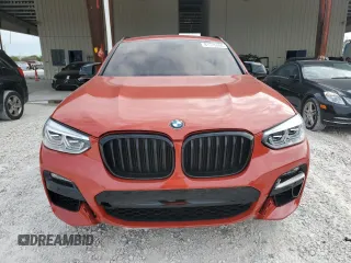 2021 BMW X4 M z VIN 5YMUJ0C02M9F18326, wystawiony jako Copart lot #81575004 z przebiegiem 48 692 mil mil oraz Nie do naprawy • Non repairable. Historia ofert i sprzedaży dostępna na DreamBid. Obrazek 5.