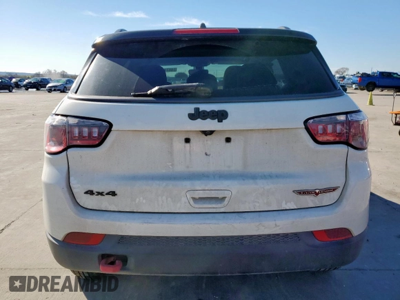 2020 Jeep Compass Trailhawk with VIN 3C4NJDDB7LT118561, listed as a Copart auction lot 46740025 with 61,286 mi miles and Salvage Title. Bid and sale history available at carsss.com. Image 6.