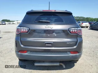 2018 Jeep Compass Sport with VIN 3C4NJCABXJT105430, listed as a Copart auction lot 59237575 with 104,600 mi miles and Salvage title. Bid and sale history available at DreamBid. Image 6.