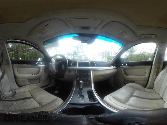 2009 Lincoln MKS с VIN 1LNHM93R09G612219, выставлен на аукционе IAAI как лот 42265639 с пробегом 203 651 миль миль и . История ставок и продаж доступна на DreamBid. Изображение 19.