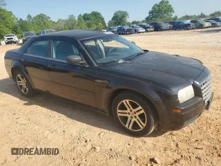 2006 Chrysler 300 z VIN 2C3KA43R06H318491, wystawiony jako Copart lot #53830045 z przebiegiem 179 090 mil mil oraz Szkoda całkowita • Salvage title. Historia ofert i sprzedaży dostępna na DreamBid. Obrazek 4.