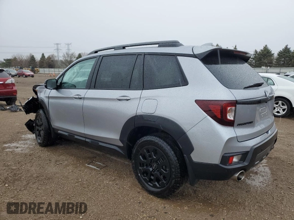 2023 Honda Passport TrailSport with VIN 5FNYF8H64PB044233, listed as a Copart auction lot 53522015 with 10,458 mi miles and Salvage title. Bid and sale history available at DreamBid. Image 2.
