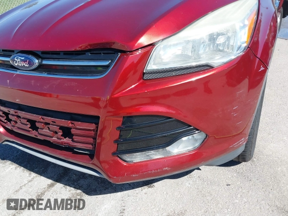 2015 Ford Escape Titanium with VIN 1FMCU9J92FUA53699, listed as a IAAI auction lot 40500310 with 197,581 mi miles. Bid and sale history available at carsss.com. Image 18.