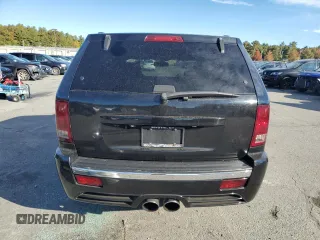 2008 Jeep Grand Cherokee SRT-8 with VIN 1J8HR78368C152318, listed as a Copart auction lot 74203604 with 157,840 mi miles and Salvage Title. Bid and sale history available at carsss.com. Image 6.