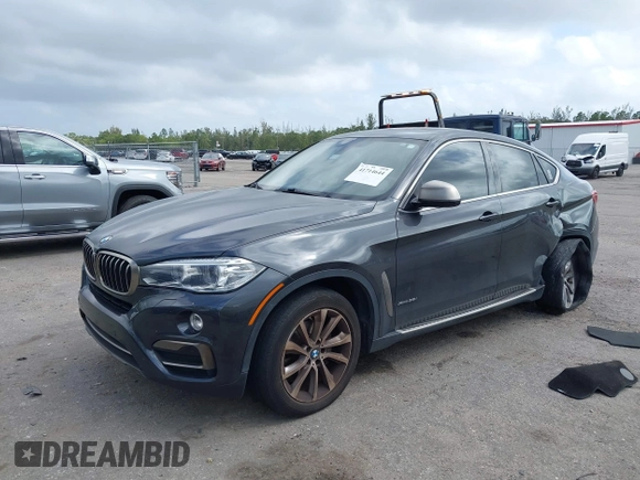 2015 BMW X6 xDrive35i z VIN 5UXKU2C59F0N76242, wystawiony jako IAAI lot #41714644 z przebiegiem 170 851 mil mil oraz . Historia ofert i sprzedaży dostępna na DreamBid. Obrazek 2.