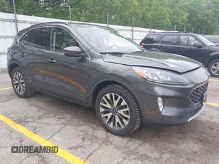 2020 Ford Escape Titanium with VIN 1FMCU9J96LUA00564, listed as a IAAI auction lot 42261152 with 73,748 mi miles and . Bid and sale history available at DreamBid. Image 1.
