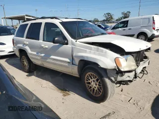 2002 Jeep Grand Cherokee Limited with VIN 1J4GX58S32C320843, listed as a Copart auction lot 77663864 with 289,537 mi miles and Salvage Title. Bid and sale history available at DreamBid. Image 4.
