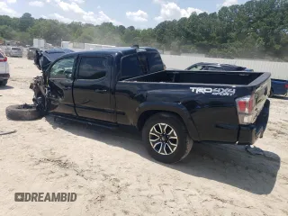 2020 Toyota Tacoma SR5 with VIN 3TMDZ5BN8LM090576, listed as a Copart auction lot 62217495 with 29,996 mi miles and Salvage title. Bid and sale history available at DreamBid. Image 2.