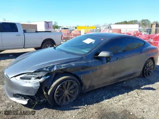 2017 Tesla Model S 100D with VIN 5YJSA1E27HF231755, listed as a IAAI auction lot 41351997 with 127,729 mi miles. Bid and sale history available at carsss.com. Image 6.
