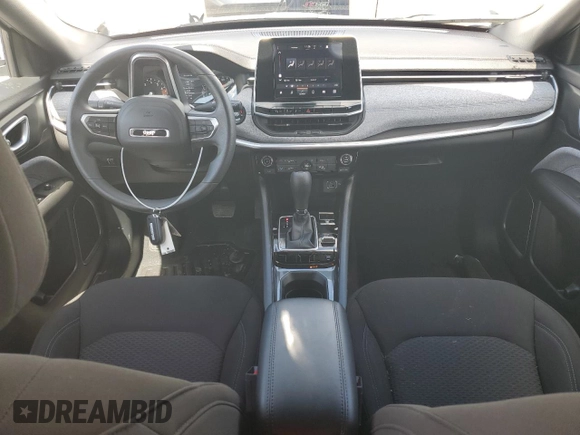 2025 Jeep Compass Sport with VIN 3C4NJDAN7ST529052, listed as a Copart auction lot 54128665 with 1,111 mi miles and Salvage title. Bid and sale history available at DreamBid. Image 8.