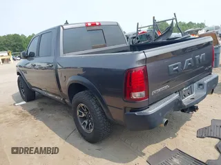2017 Ram 1500 Rebel with VIN 1C6RR7YT6HS861839, listed as a IAAI auction lot 42407025 with 127,084 mi miles and . Bid and sale history available at DreamBid. Image 3.